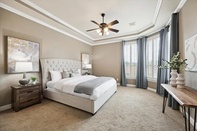 a bedroom with a bed furniture and a window