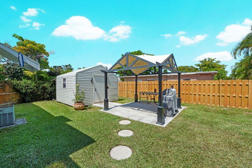 3074 Lillian Road Palm Springs, FL 33406 - Photo 19 of 22 Rear 3