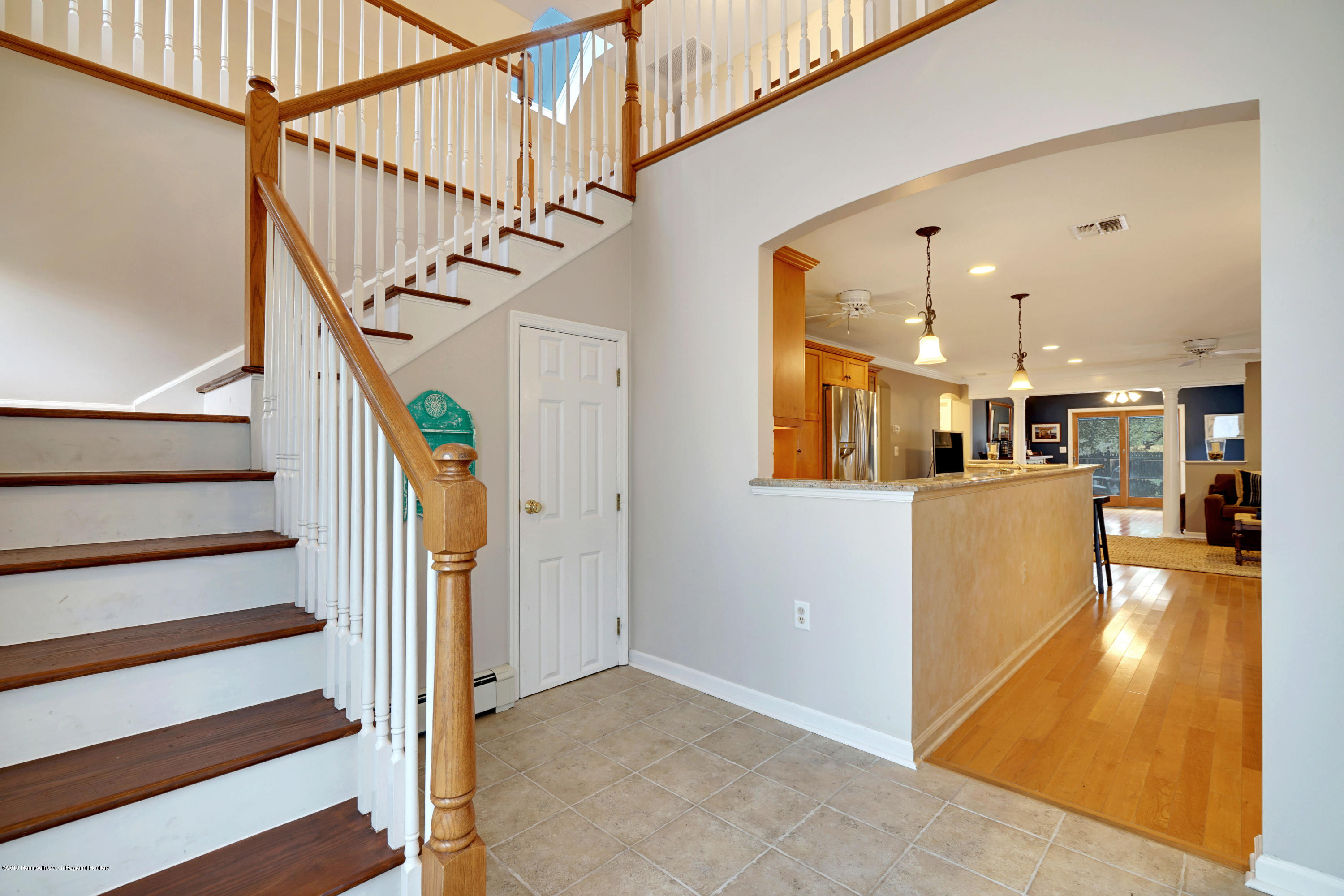 1846 Fernwood Road Lake Como, NJ 07719 - Photo 3 of 34 a view of a hallway with wooden floor and staircase