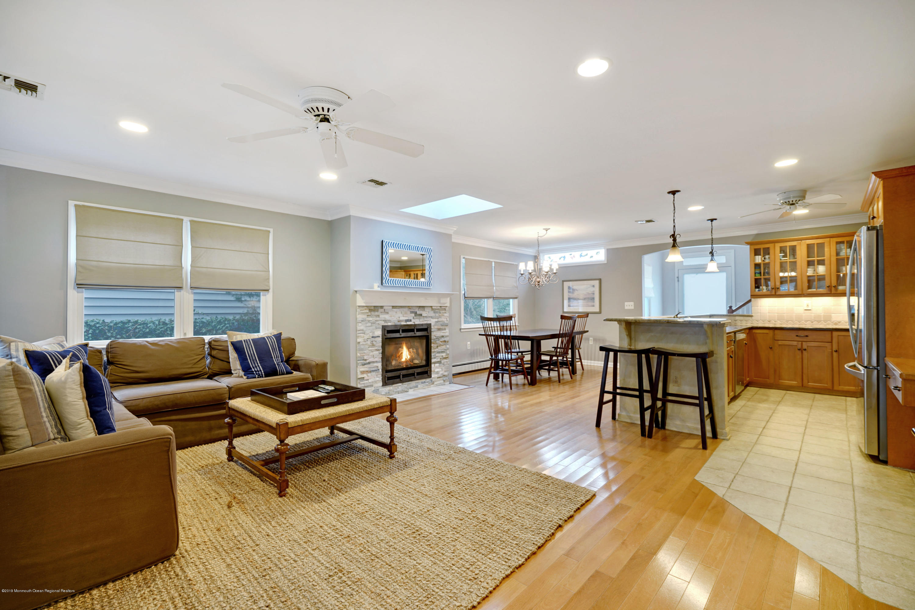 1846 Fernwood Road Lake Como, NJ 07719 - Photo 9 of 34 a living room with furniture and a fireplace