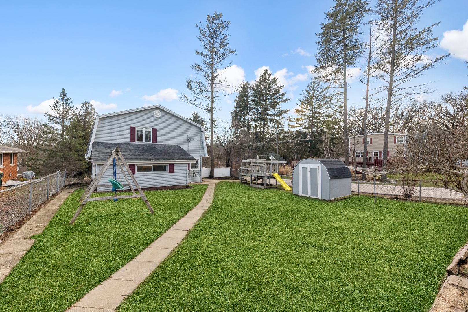 8314 Riverway Drive Cary, IL 60013 - Photo 12 of 12 a view of a house with a yard and sitting area