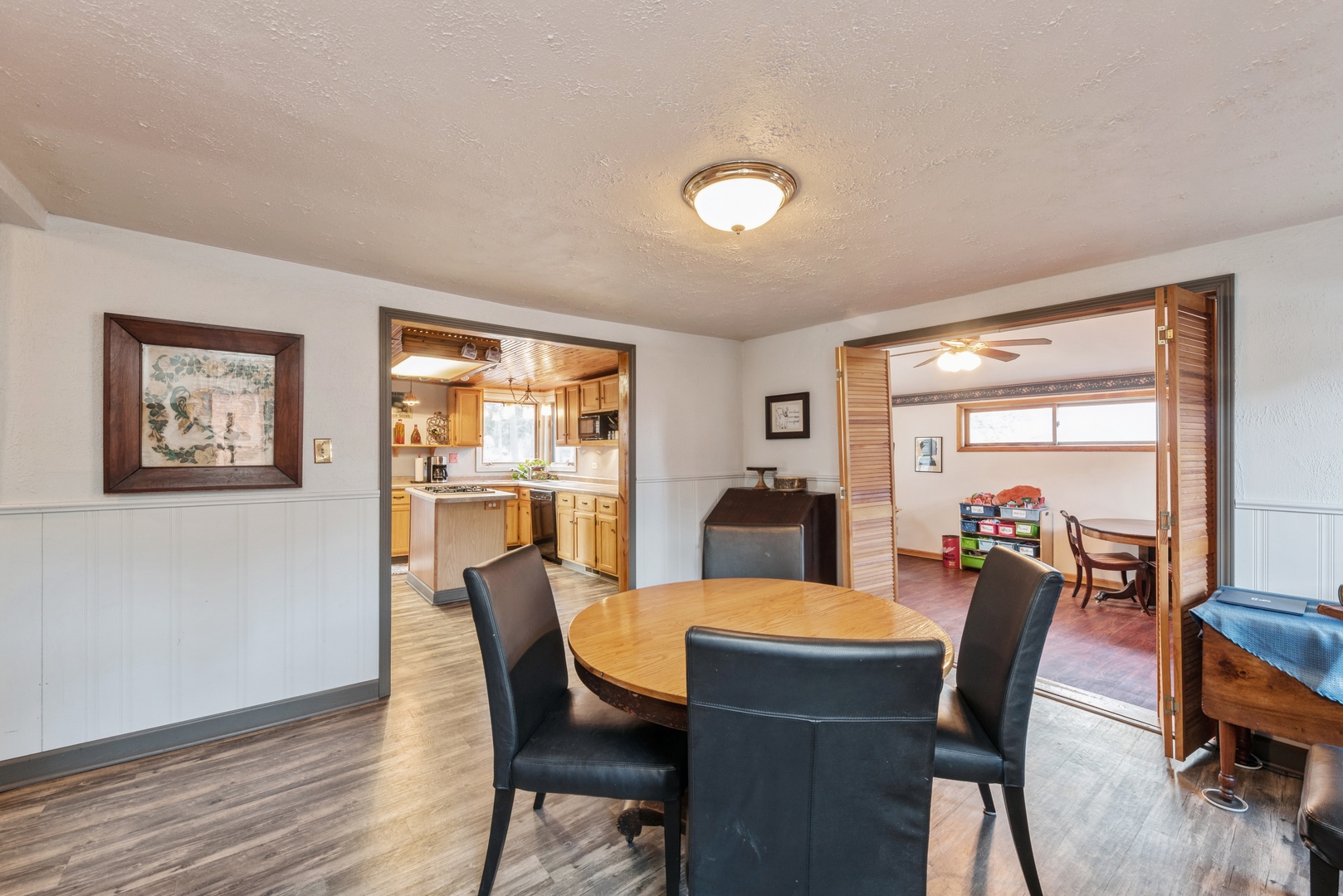 8314 Riverway Drive Cary, IL 60013 - Photo 4 of 12 a view of a dining room with furniture window and wooden floor