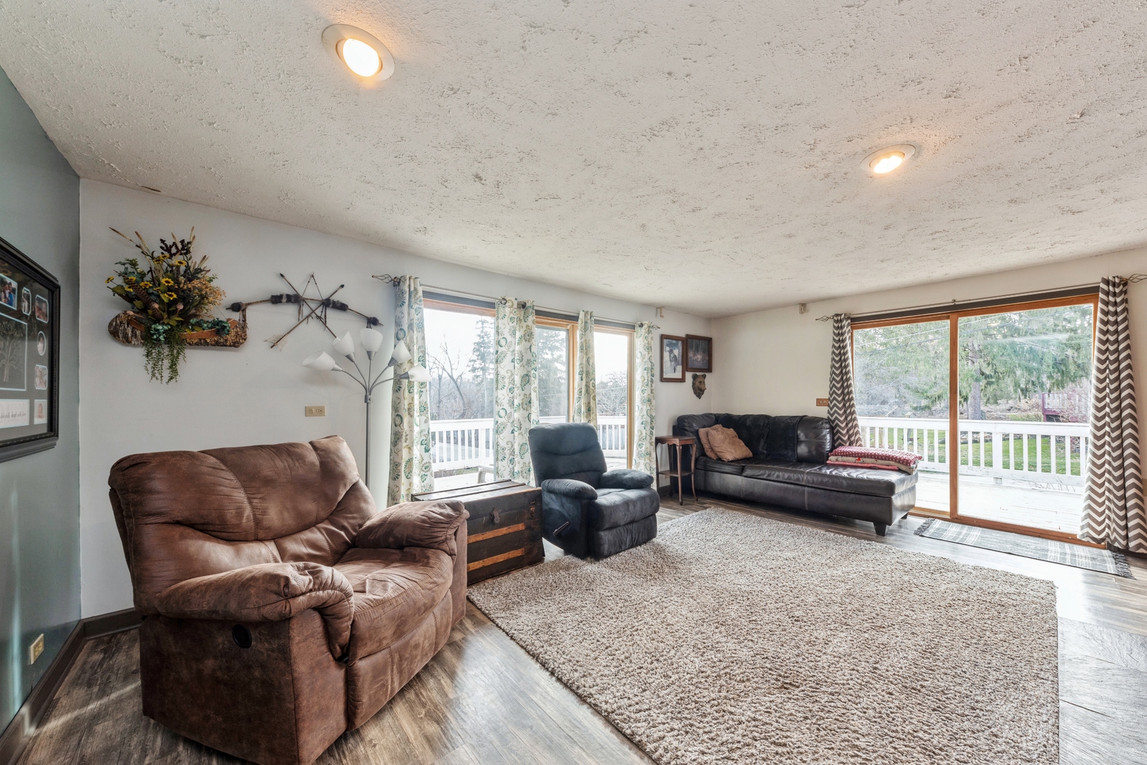 8314 Riverway Drive Cary, IL 60013 - Photo 5 of 12 a living room with furniture and a large window