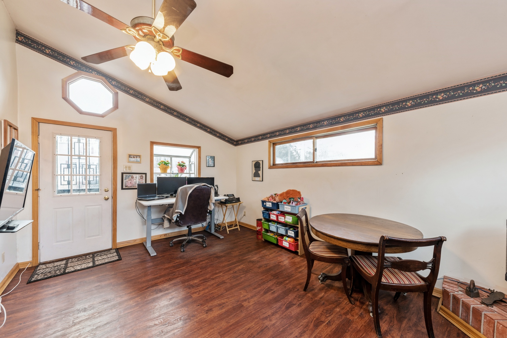 8314 Riverway Drive Cary, IL 60013 - Photo 6 of 12 a view of a workspace with furniture and a window