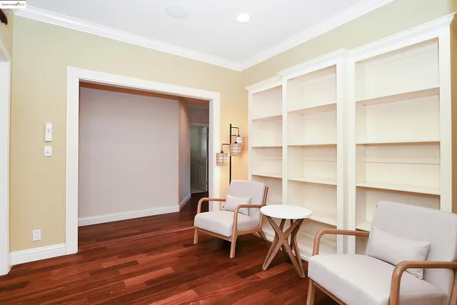 a bedroom with a bed and a desk