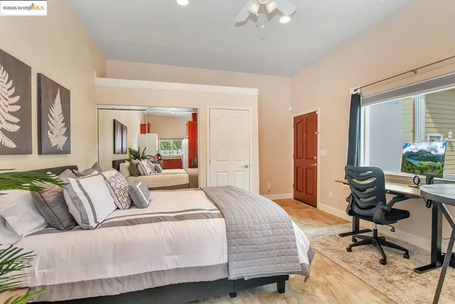 a work room with furniture and a window