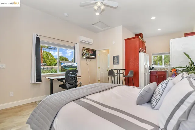 a picture of a bench in a room