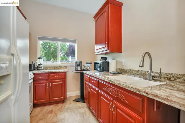 a bedroom with a bed and a table in it