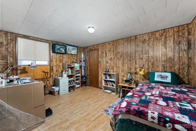 a bedroom with a bed and furniture