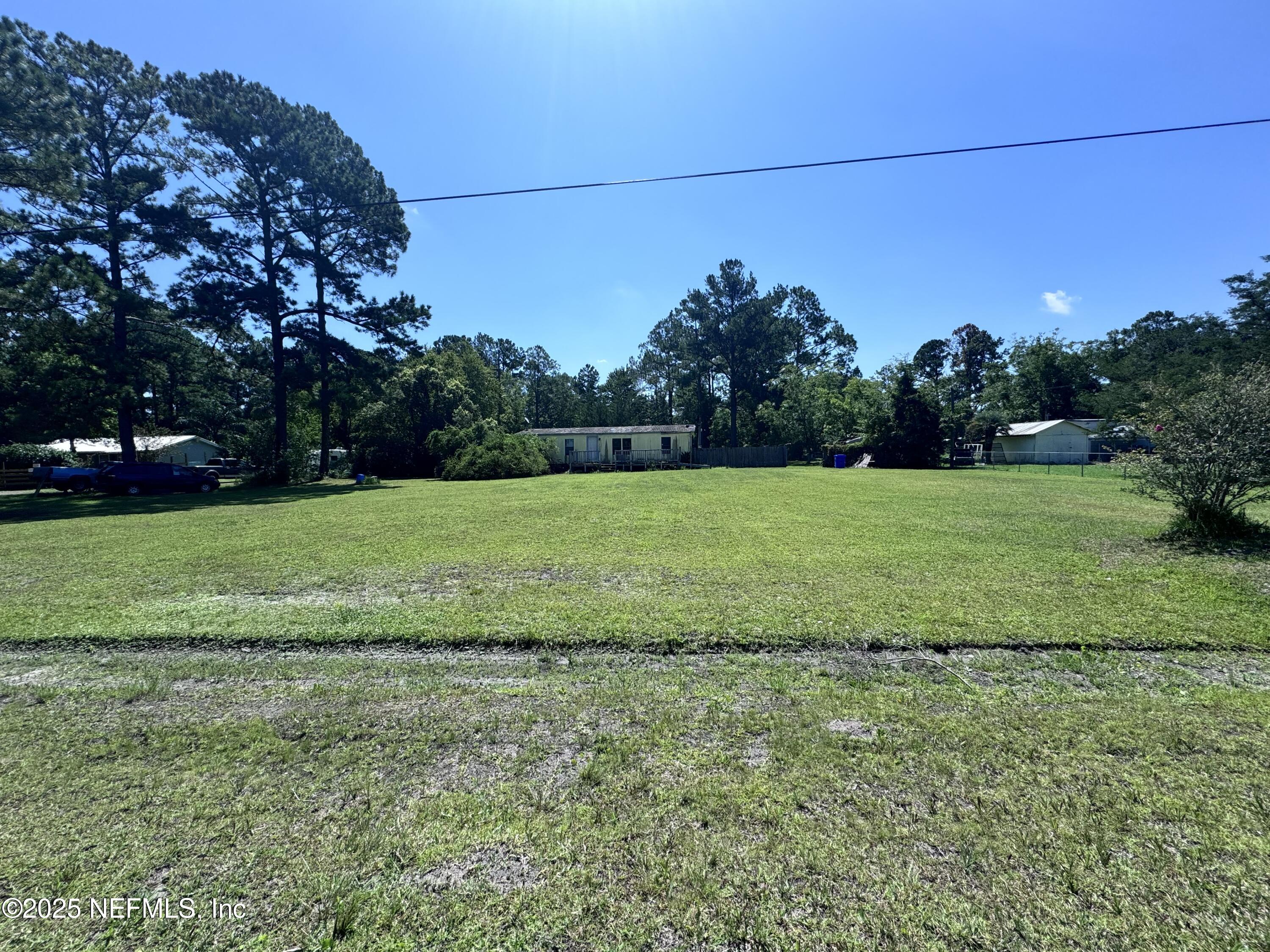 54440 Bea Road Callahan, FL 32011 - Photo 3 of 7 a view of a field with grass