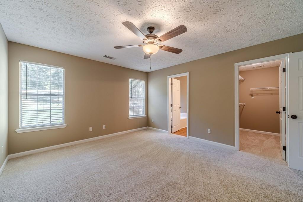701 Woodland Ridge Drive Monroe, GA 30656 - Photo 20 of 39 a view of an empty room with a window