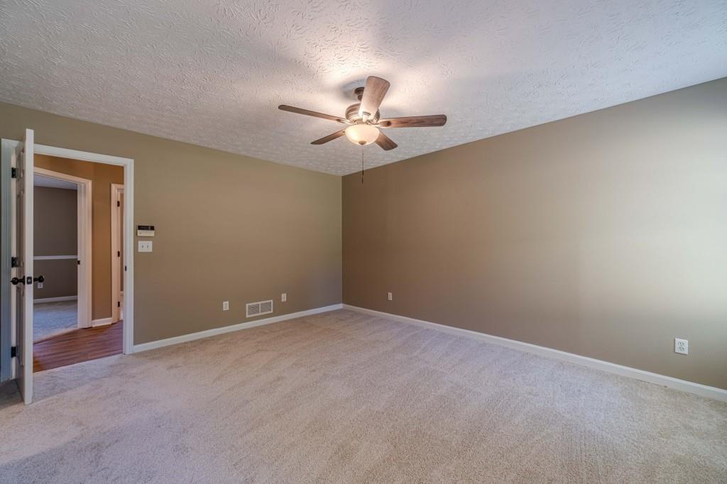 701 Woodland Ridge Drive Monroe, GA 30656 - Photo 22 of 39 wooden floor in an empty room