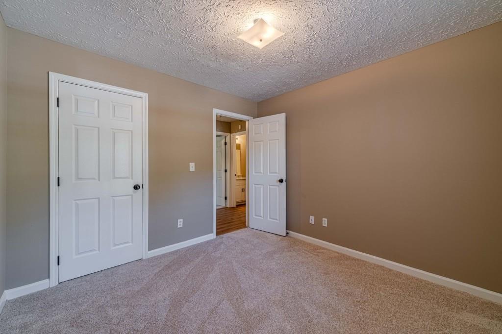 701 Woodland Ridge Drive Monroe, GA 30656 - Photo 27 of 39 a view of an empty room