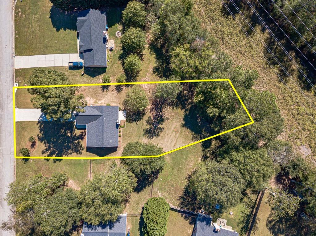 701 Woodland Ridge Drive Monroe, GA 30656 - Photo 37 of 39 an aerial view of a houses with swimming pool