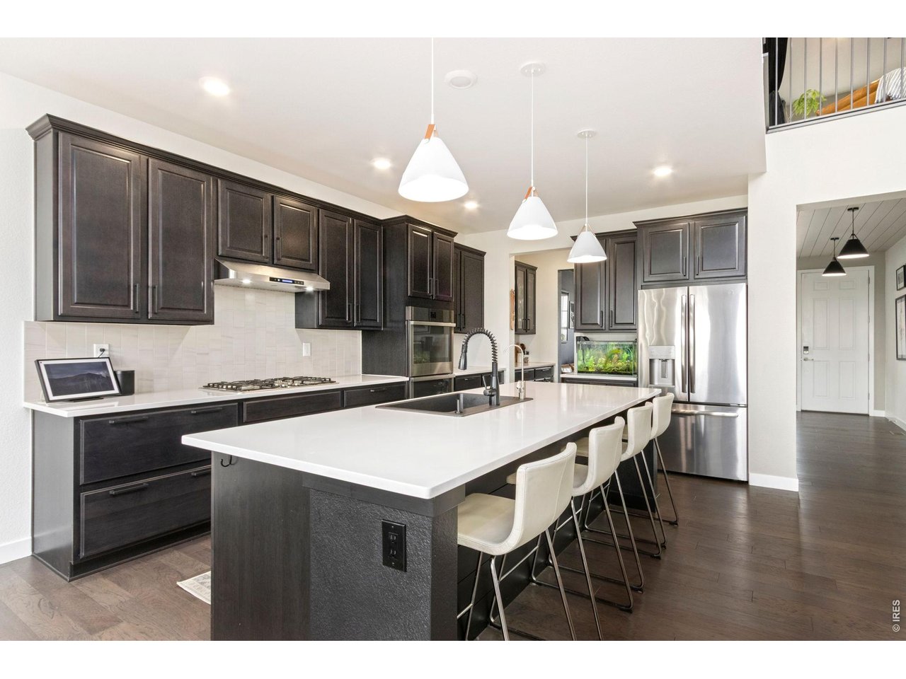 2936 Fractus Street Timnath, CO 80547 - Photo 5 of 25 Two tone modern kitchen