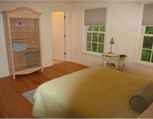 3 Circle Road Darien, CT 06820 - Photo 17 of 20 a bedroom with a bed and a window