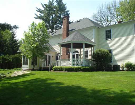 3 Circle Road Darien, CT 06820 - Photo 4 of 20 a front view of a house with a yard