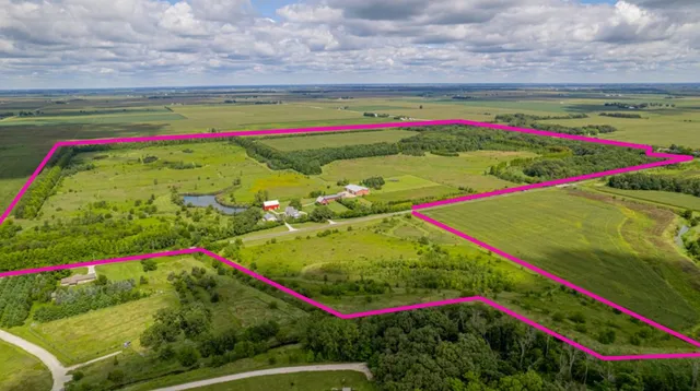 a view of swimming pool from a outdoor seating
