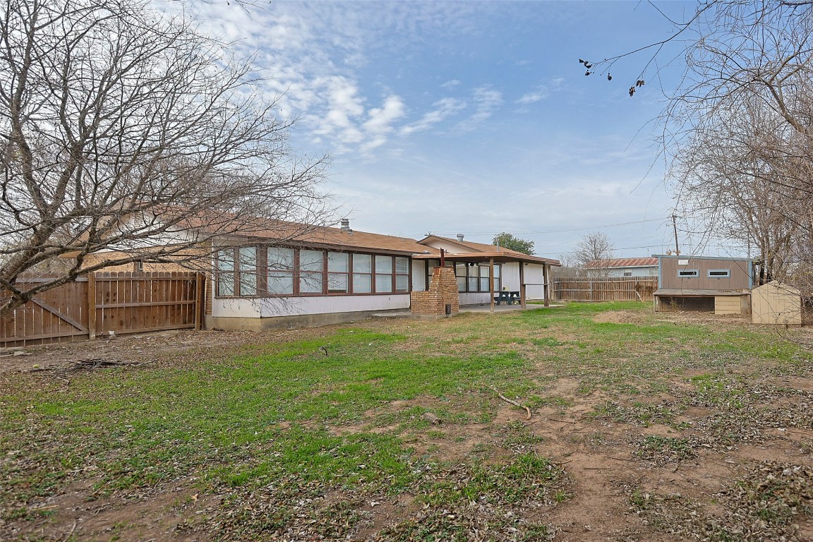 111 Branch View Drive Kyle, TX 78640 - Photo 16 of 27 a view of a house with backyard and a garden