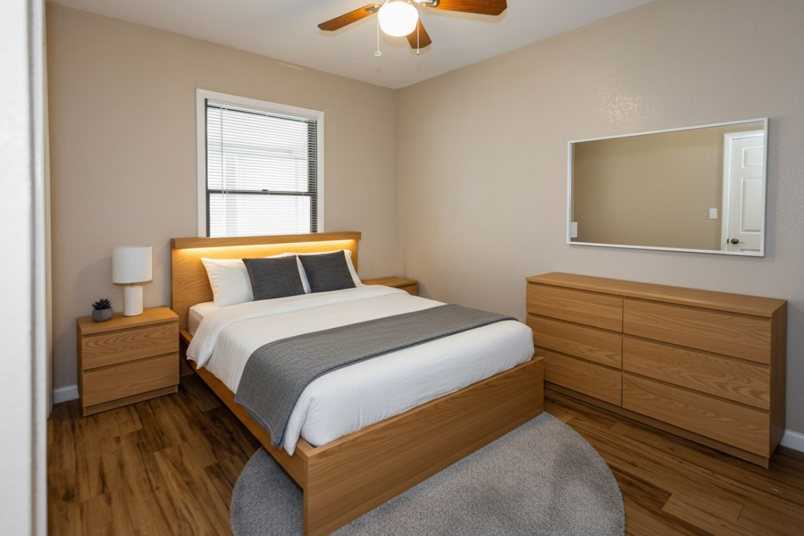 111 Branch View Drive Kyle, TX 78640 - Photo 17 of 27 a bedroom with a bed and window