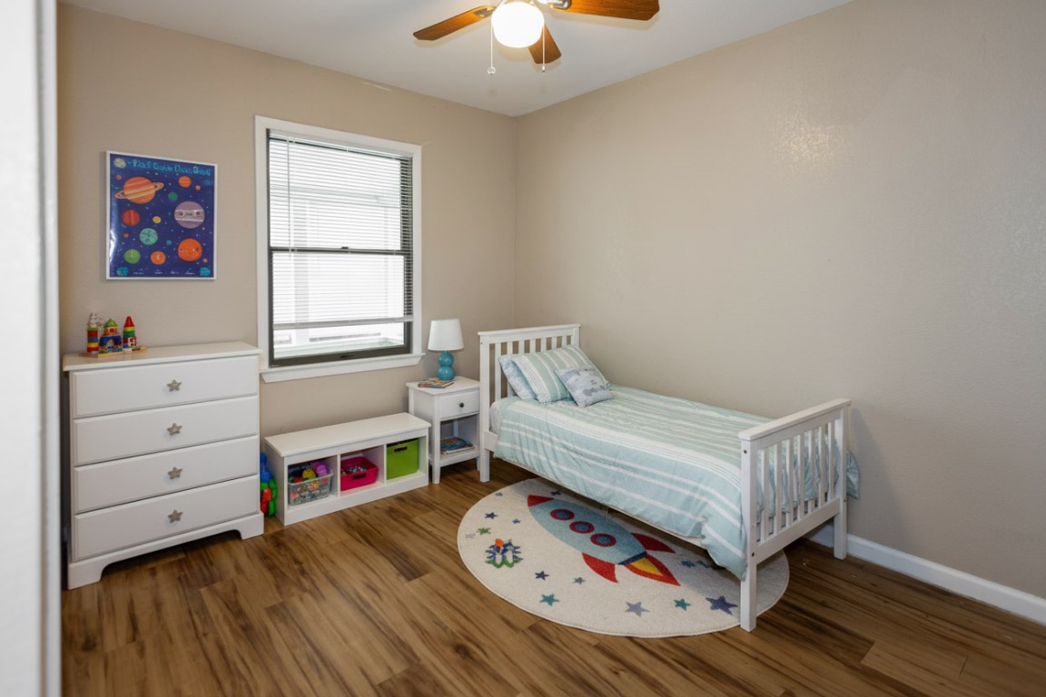111 Branch View Drive Kyle, TX 78640 - Photo 19 of 27 a bedroom with furniture and a window
