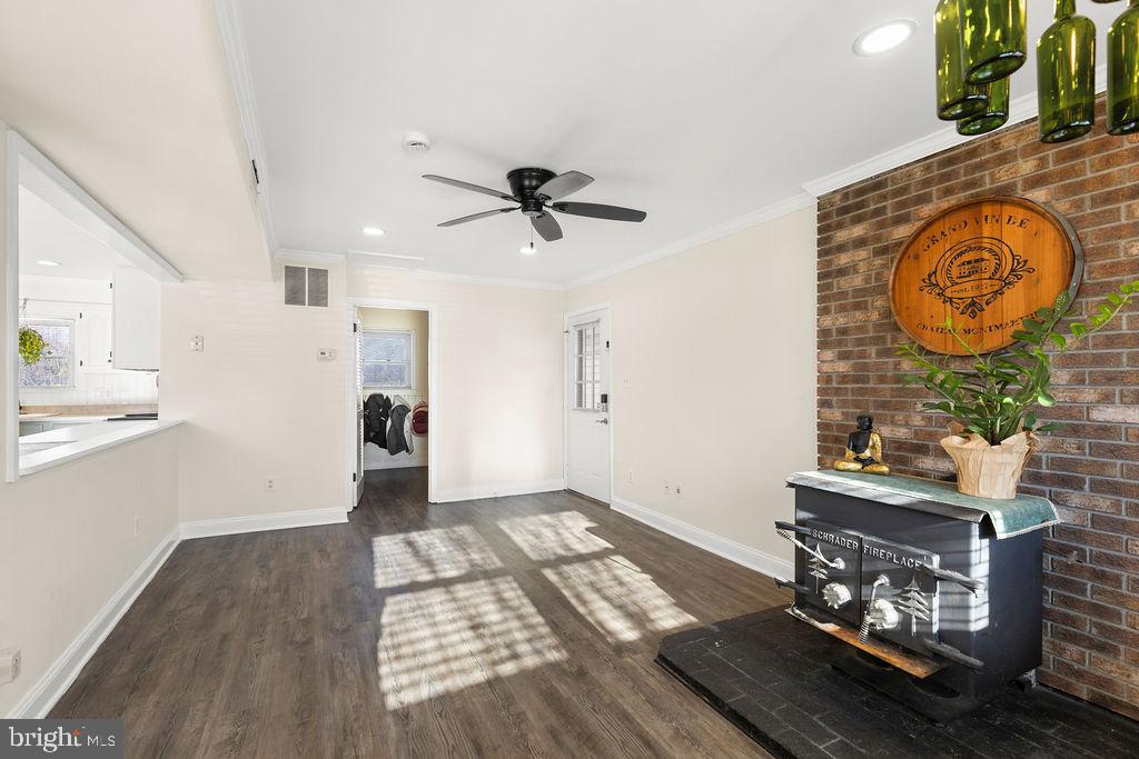 503 South Maple Court Sterling, VA 20164 - Photo 12 of 43 a view of kitchen with furniture and wooden floor