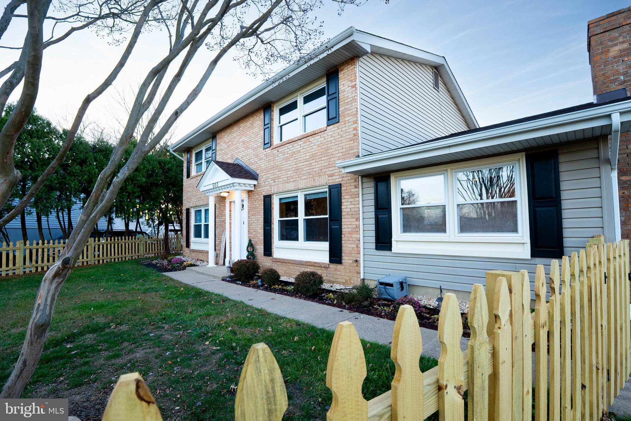 503 South Maple Court Sterling, VA 20164 - Photo 2 of 43 a front view of a house with garden