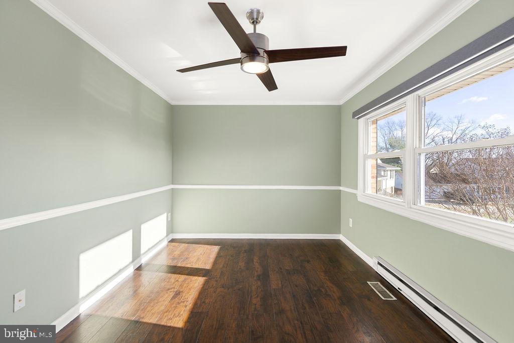 503 South Maple Court Sterling, VA 20164 - Photo 28 of 43 a view of a room with wooden floor and windows