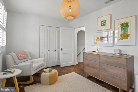 a room with furniture and a window