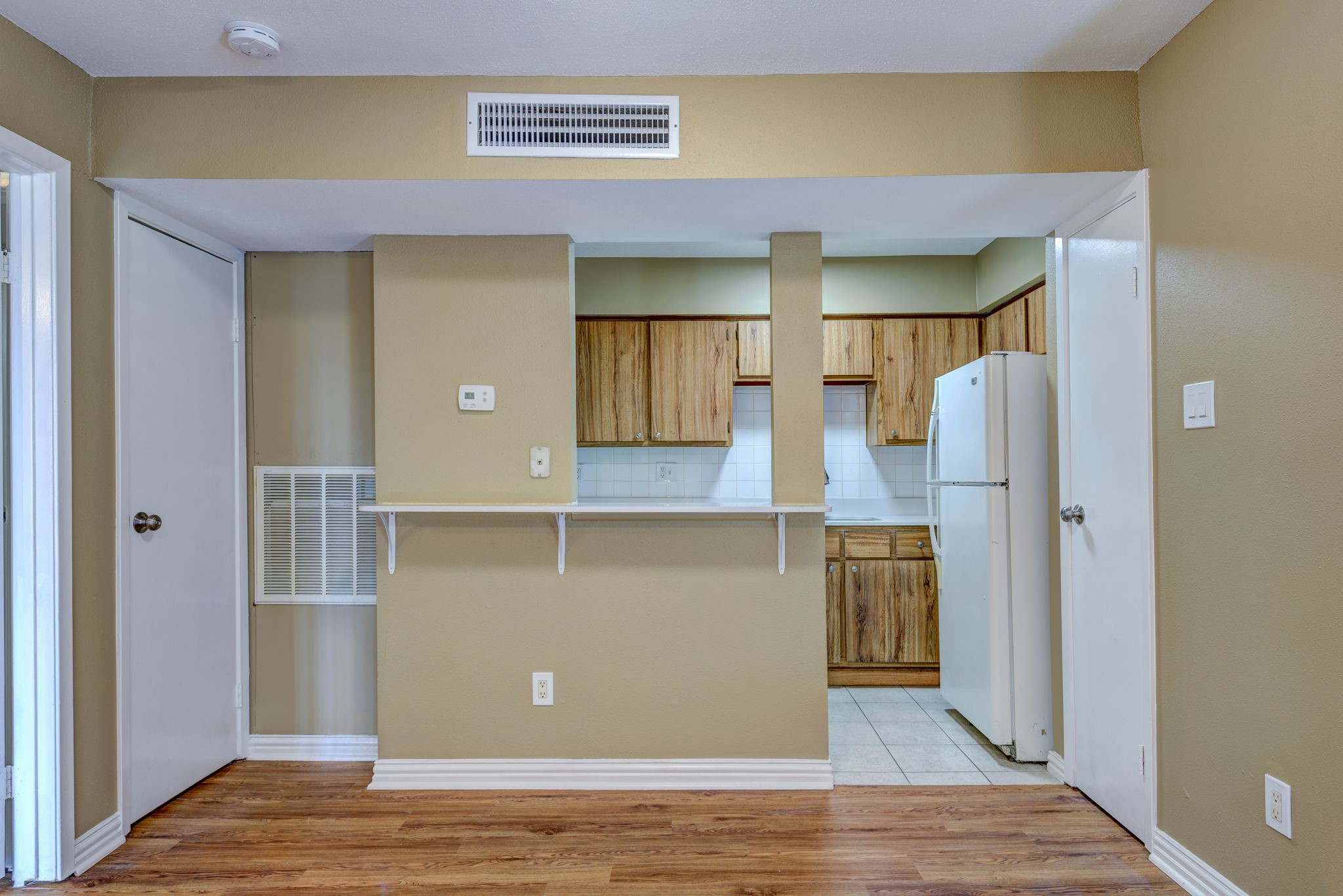 18519 Egret Bay Boulevard, Unit 1704 Webster, TX 77058 - Photo 2 of 35 a view of kitchen and living room