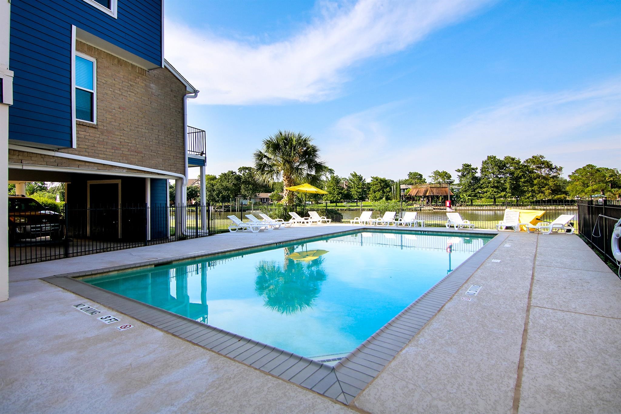 18519 Egret Bay Boulevard, Unit 1704 Webster, TX 77058 - Photo 29 of 35 a view of swimming pool with outdoor seating