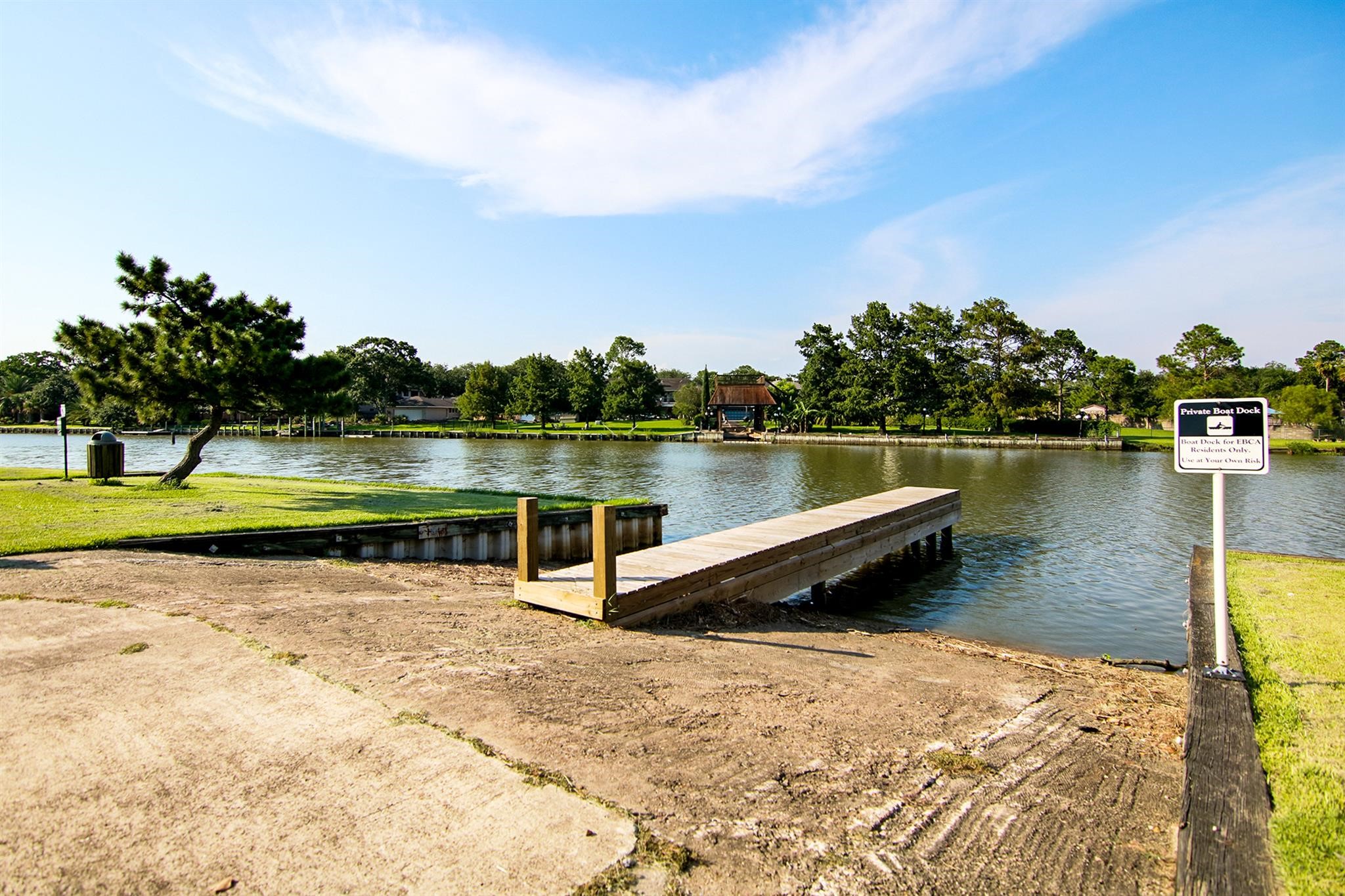 18519 Egret Bay Boulevard, Unit 1704 Webster, TX 77058 - Photo 33 of 35 a view of a lake with houses in the back