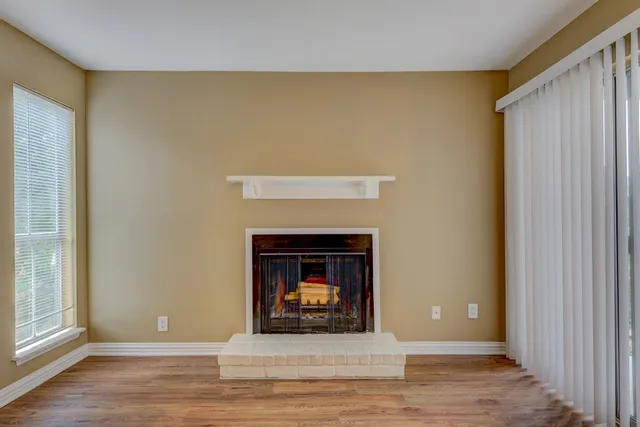 a living room with a fireplace