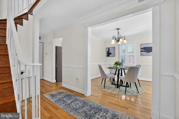 a bedroom with a bed and a lamp on table