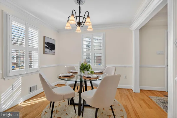 a bedroom with a bed and a night stand