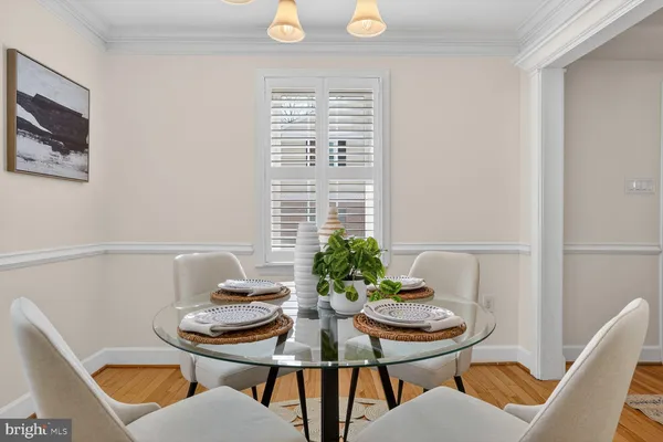 a bedroom with a bed and lamp on table
