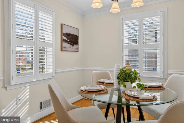a bathroom with a sink a toilet and shower curtain