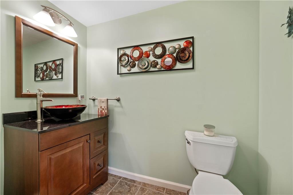 405 East Washington Street Rochester, PA 15074 - Photo 12 of 26 a kitchen with a sink and a toilet