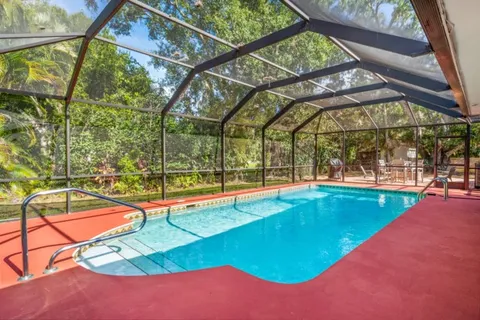 swimming pool with outdoor seating