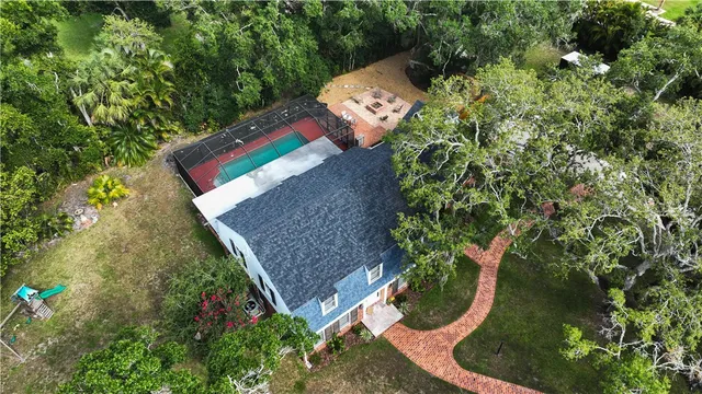 an aerial view of a house having yard