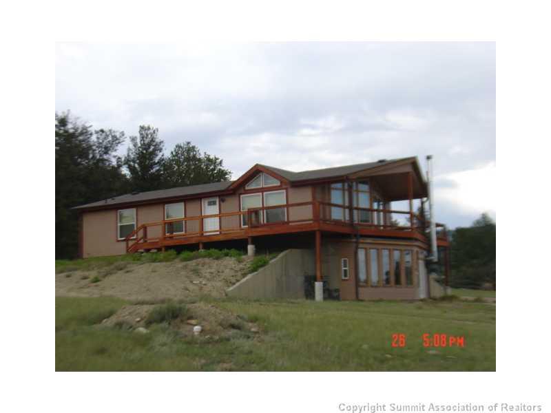 5220 Co 5 Road Fairplay, CO 80440 - Photo 1 of 18 a view of a house with a yard