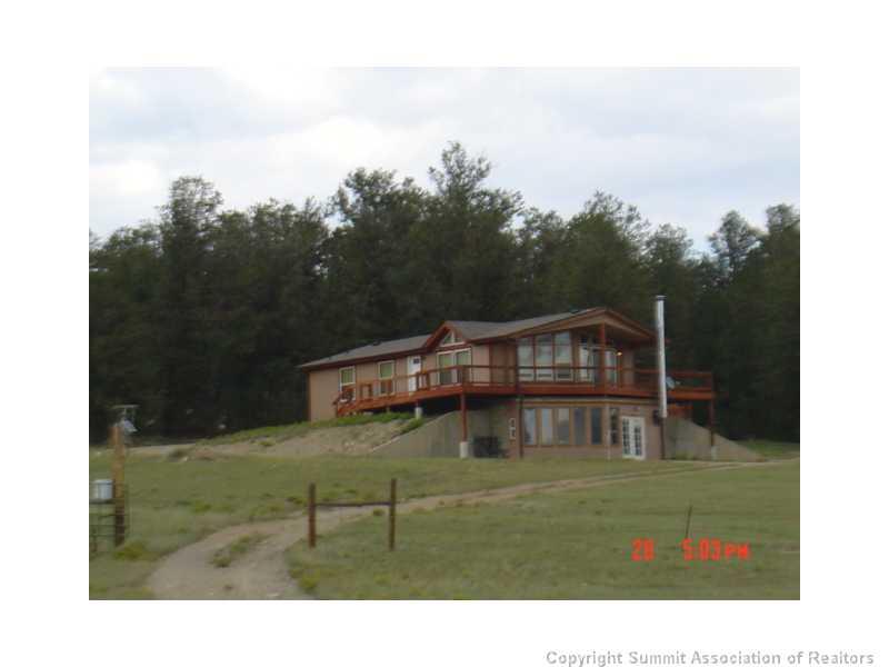 5220 Co 5 Road Fairplay, CO 80440 - Photo 3 of 18 a view of a house with a yard