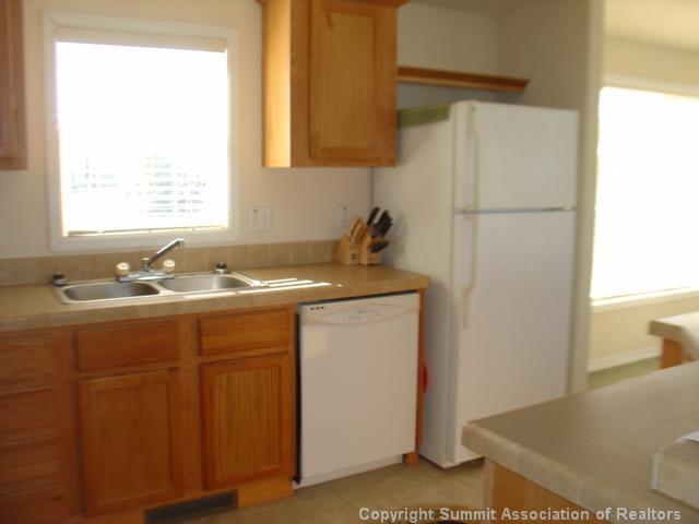 5220 Co 5 Road Fairplay, CO 80440 - Photo 8 of 18 a kitchen with a sink and a refrigerator