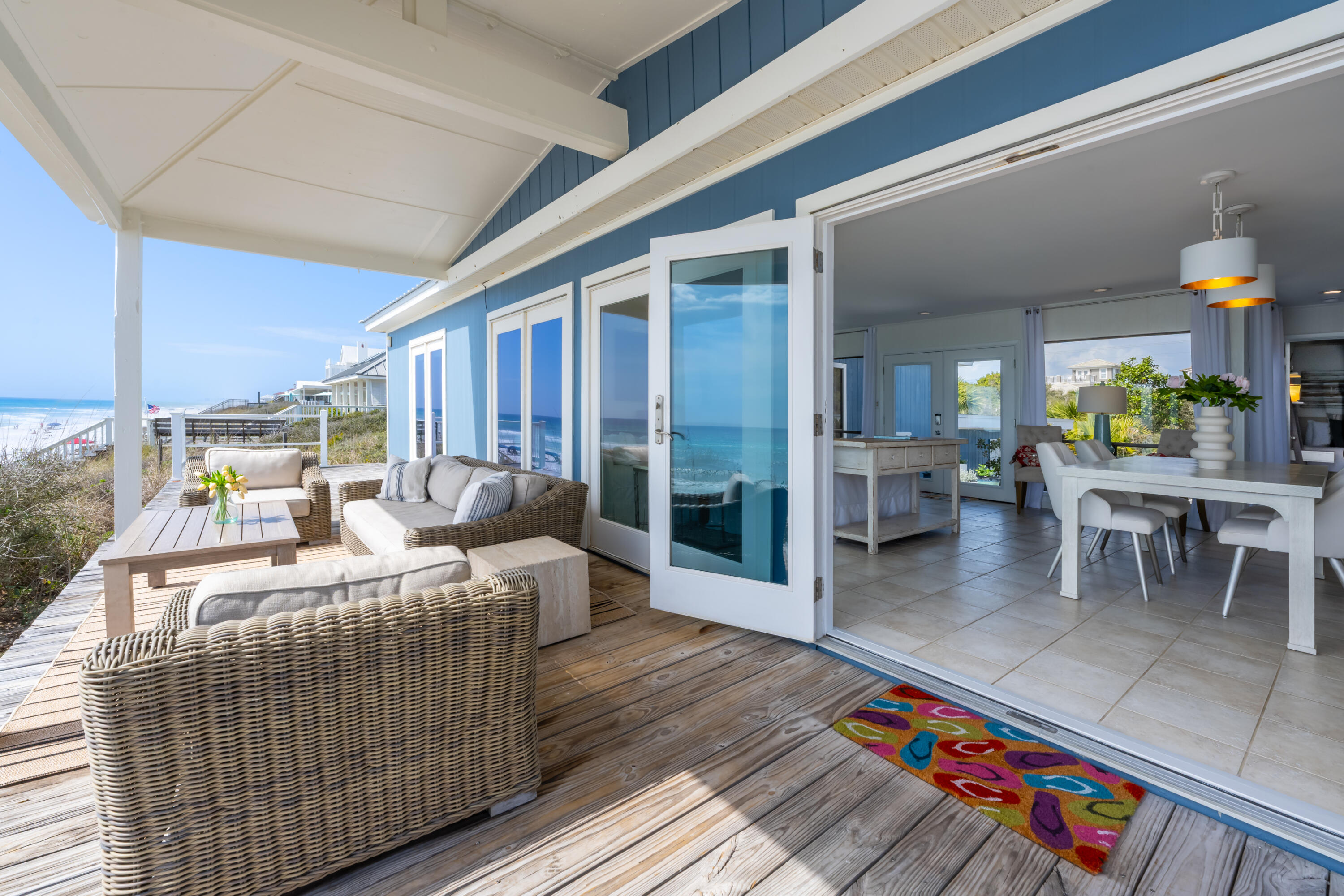 4731 West County Highway 30A Santa Rosa Beach, FL 32459 - Photo 17 of 44 a living room with furniture a rug and a table