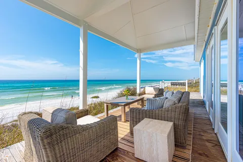 a view of a balcony with chairs
