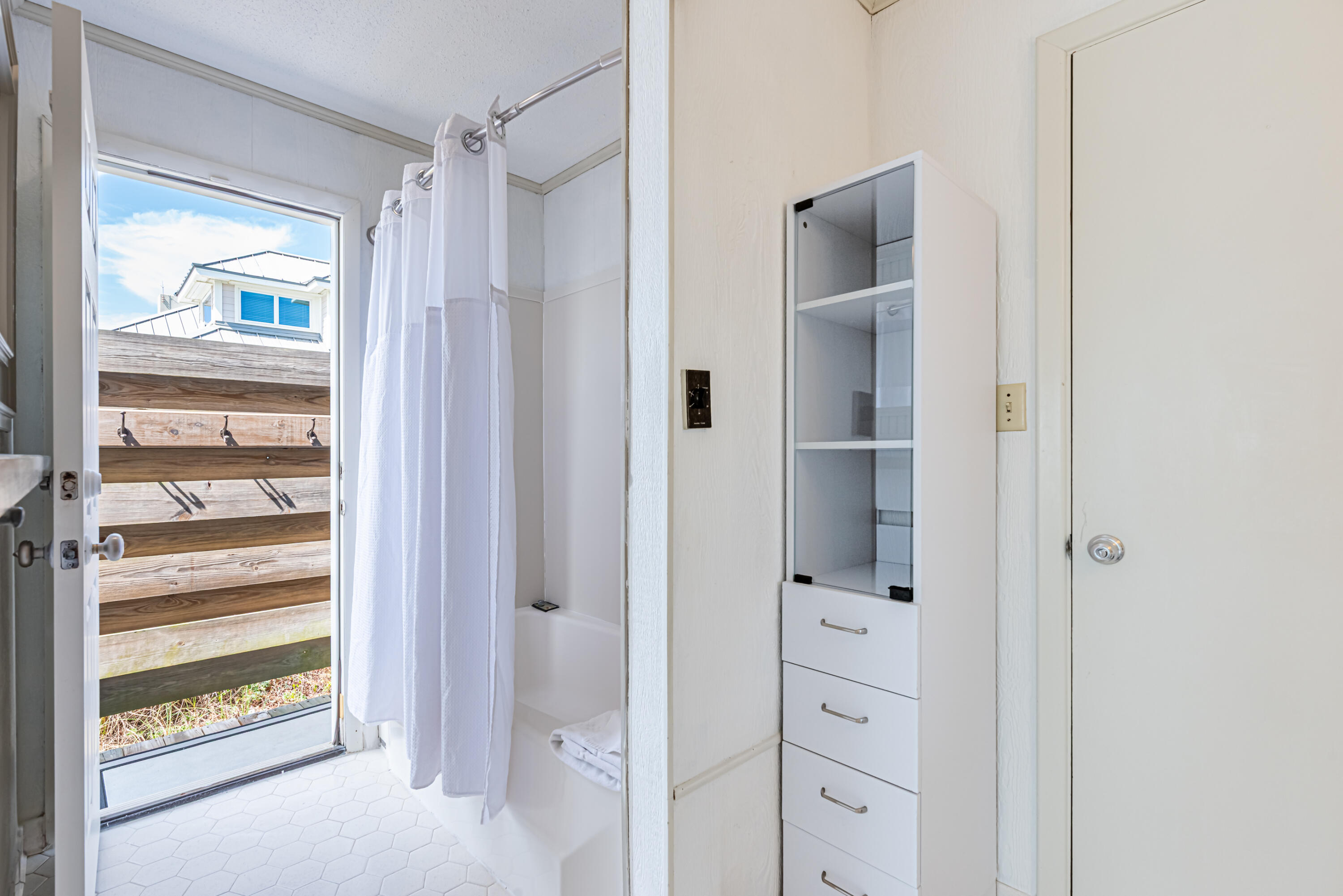 4731 West County Highway 30A Santa Rosa Beach, FL 32459 - Photo 28 of 44 a bathroom with a walk in closet
