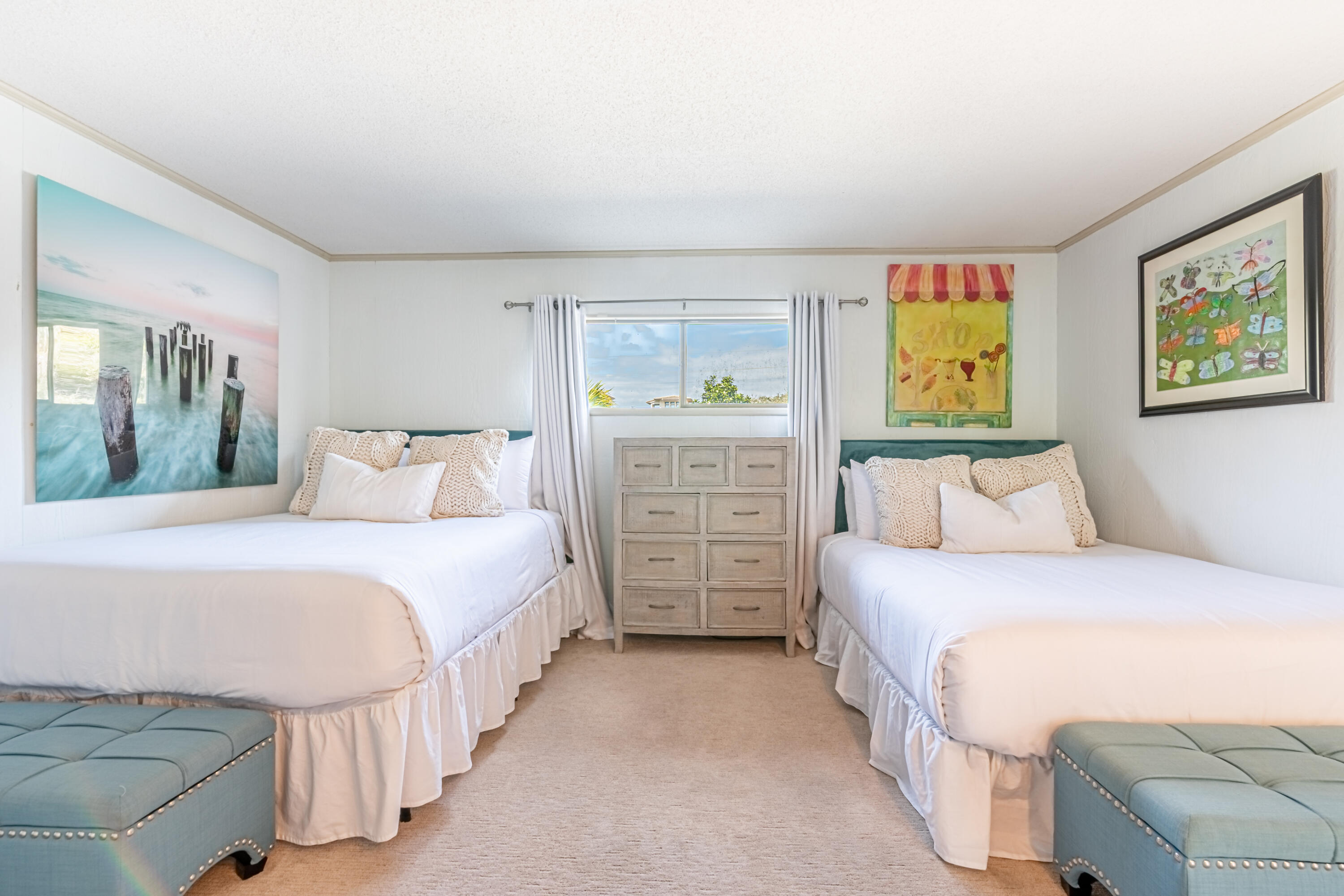 4731 West County Highway 30A Santa Rosa Beach, FL 32459 - Photo 31 of 44 a bedroom with a bed and painting on the wall