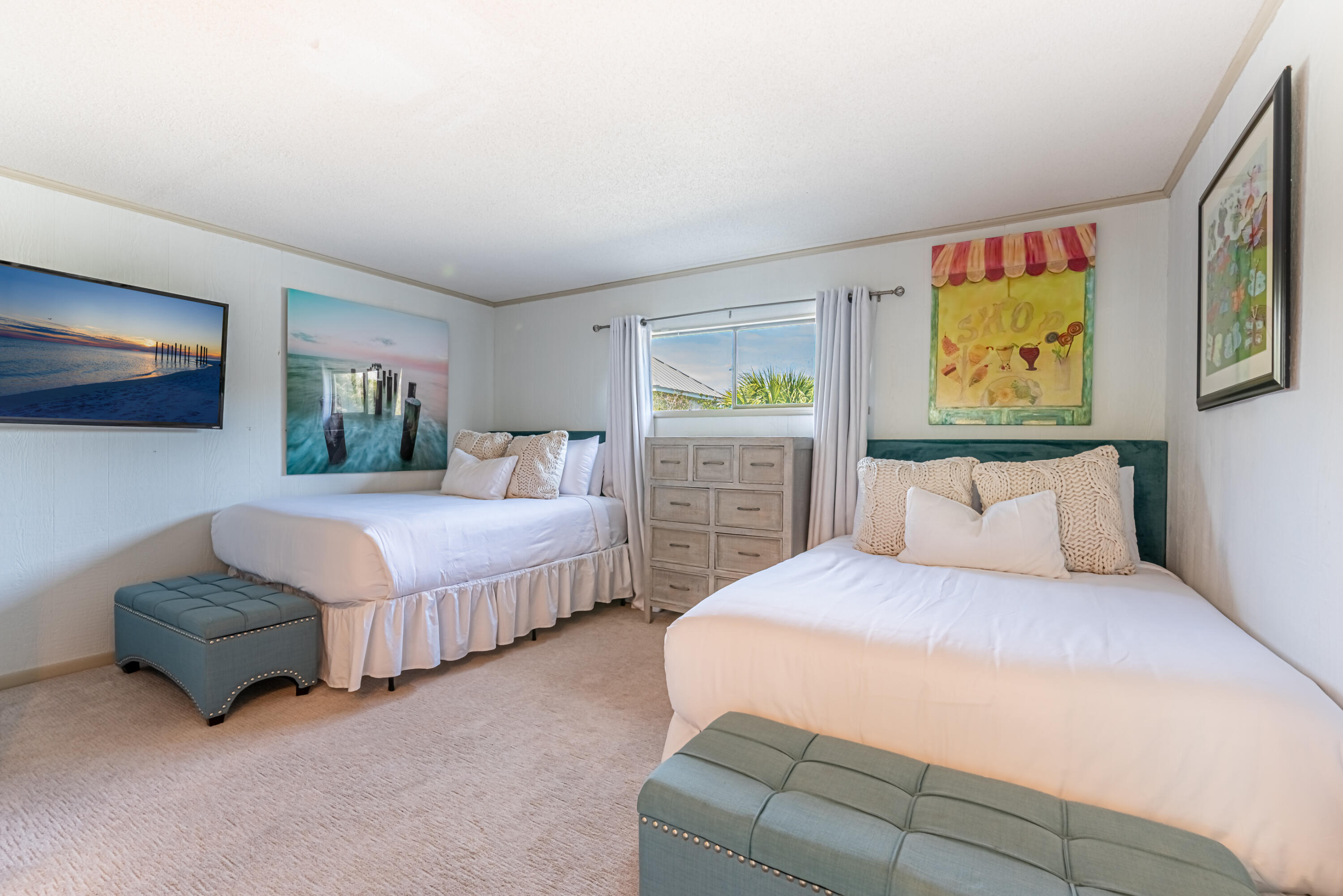 4731 West County Highway 30A Santa Rosa Beach, FL 32459 - Photo 32 of 44 a bedroom with a bed and a couch