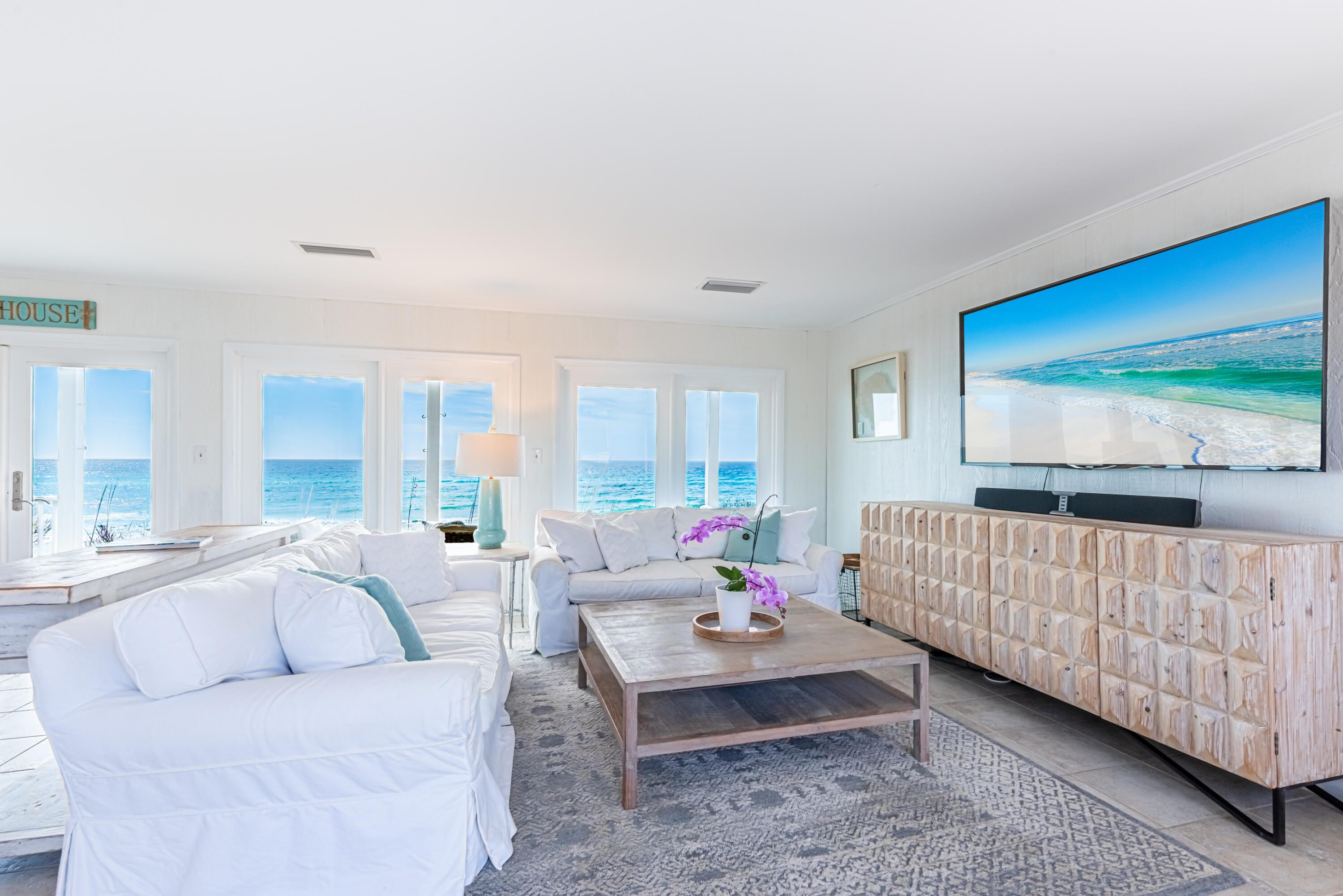 4731 West County Highway 30A Santa Rosa Beach, FL 32459 - Photo 6 of 44 a bedroom with furniture and a large window