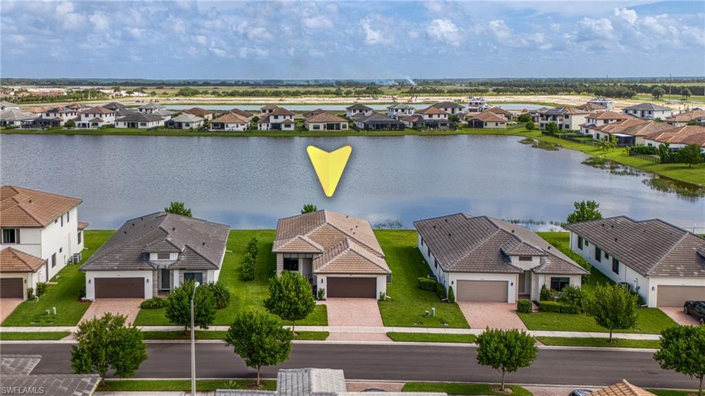 4951 Brigata Way Avenue Immokalee, FL 34142 - Photo 1 of 49 an aerial view of residential building with outdoor space and ocean view